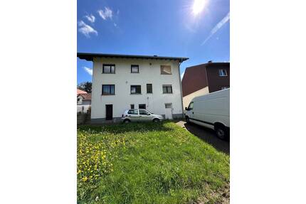 Zweifamilienhaus mit Garten und vier Garagen plus Einliegerwohnung - Mossautal Ober-Mossau