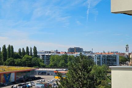 Wir verkaufen unsere 4-Zimmer-Wohnung mit Weitblick über München