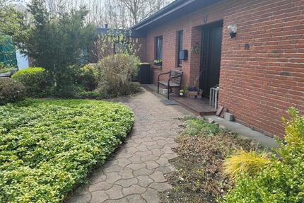 Ebenerdiger, freistehender Winkelbungalow mit Einliegerwohnung - Tarp