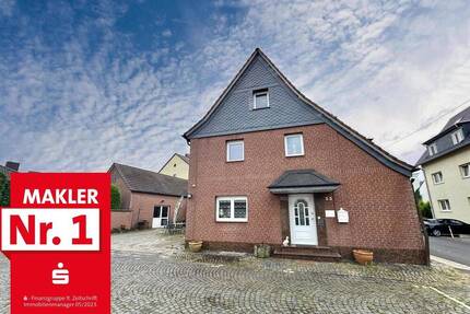 Zwei Wohnhäuser mit Gewerbe, großem Lager und 4 Garagen in Leverkusen Bürrig