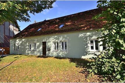 Einfamilienhaus auf ideell geteilten Grundstück mit Wasserzugang - Alt Ruppin