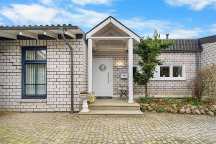 Besonderes Einfamilienhaus in begehrter Lage von Ratekau auf schönem Grundstück