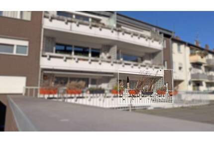 Wohnen in Dinslaken: 3,5-Zimmer-Hochparterre-Wohnung mit Balkon & Garage!