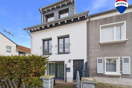 Modernisiertes Reihenendhaus in Schwalbach-Hülzweiler - hell, hochwertig & sofort bezugsbereit