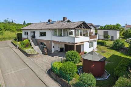 Haus zum Kaufen in Wölfersheim 424.500,00 € 136.44 m²