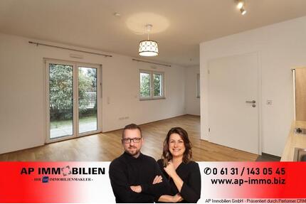 ERDGESCHOSSTRAUM mit TERRASSE - 2 Zimmer, 57 m², EBK, TG-Stellplatz - Harxheim