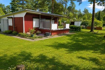 IDYLLISCHER BUNGALOW IN PLÖTZKY MIT GARAGE & EINBAUKÜCHE IHR PERSÖNLICHES REFUGIUM AM KOLUMBUSSEE