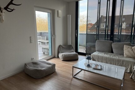 Urbaner Wohntraum: Stilvolle Maisonette-Wohnung mit großzügiger Dachterrasse in Münster!