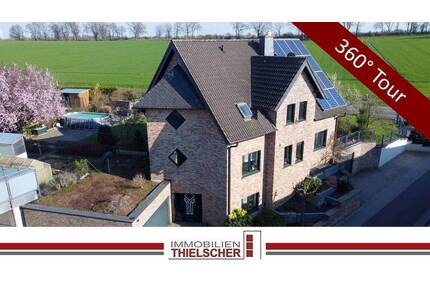 Großes freistehendes Einfamilienhaus mit 2 Garagen, Wintergarten und idyllischem Garten am Feldrand - Geilenkirchen / Müllendorf
