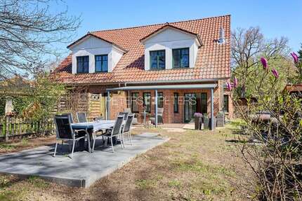 Haus zum Kaufen in Adendorf 470.000,00 € 121.12 m²