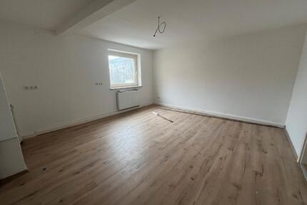 Zentrale 4-Zimmer-Wohnung mit Dachgeschosszimmern in Hof