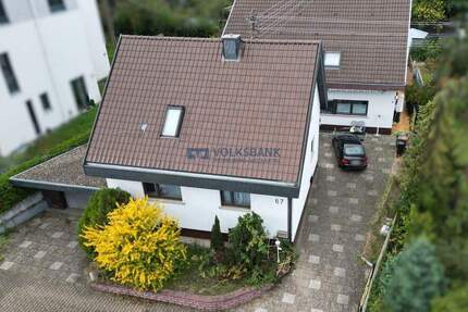 2 Einfamilienhäuser auf einem großen Grundstück mit Garagen und Garten! - Walldorf