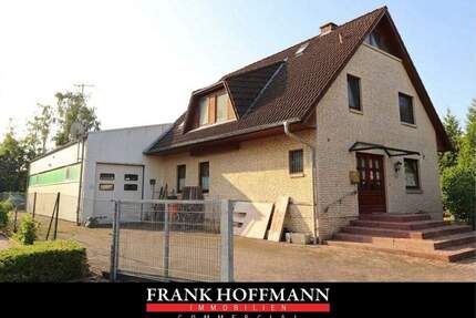Einfamilienhaus mit Gewerbehalle in Quickborn