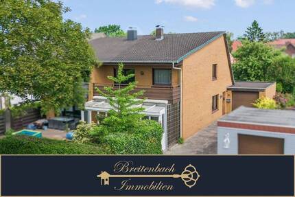 Wohnen mit Wohlfühlfaktor - Doppelhaushälfte mit Kamin und Wintergarten - Nordenham