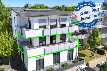 Neuwertige 3 Zi-Wohnung im 1. OG mit Personenaufzug, Kellerraum und 2 PKW - Stellplätzen in Messel!