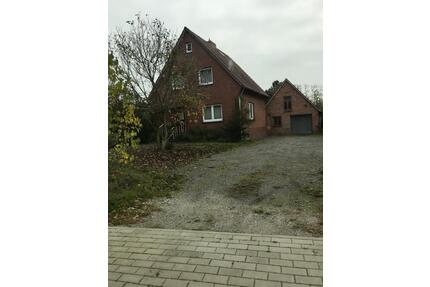 Einfamilienhaus mit großem Grundstück und Nebengebäude - Lemwerder