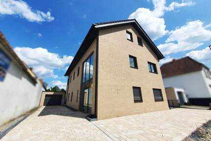 Architektur auf höchstem Niveau - Exklusives Zweifamilienhaus mit High-End-Ausstattung & stilvoller Ästhetik - Gütersloh Innenstadt