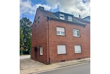Reiheneckhaus - mit großem Garten - 899 m² Grundstück - zwei Garagen - in guter Lage von Kohlscheid (Herzogenrath) - derzeit an zwei Mieter vermietet