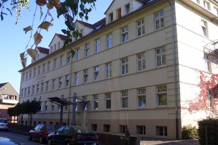 Wohnen in einem historischen Baudenkmal: 3-Zimmer-Eigentumswohnung im Erdgeschoss mit Balkon- Nähe Krankenhaus - Bünde