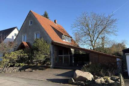 Zweifamilienhaus mit großem Garten in ruhiger Wohngegend von Lage-Pottenhausen