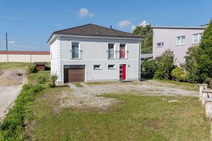 Haus zum Kaufen in Hebertshausen 849.000,00 € 100 m²