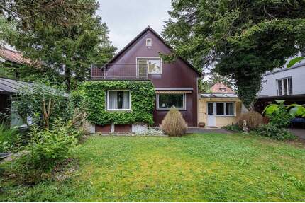 AIGNER - Ruhig gelegenes Einfamilienhaus mit großzügigem Garten in Hadern - München
