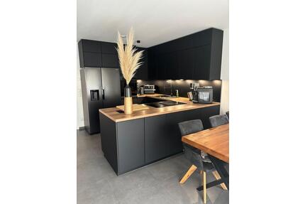 Moderne KfW 55EE Erdgeschosswohnung mit Garten - Paderborn Elsen