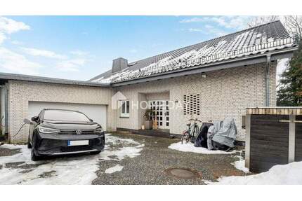 Wohnen mit Weitblick - Neun Zimmer, Gartenidylle und vermietete Souterrainwohnung - Glinde Reinbek