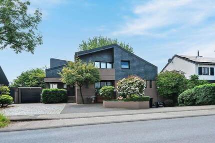 PHI AACHEN - Sonnenverwöhntes Wohnglück mit Einliegerwohnung, Spa-Bereich und Garagen in Aachen!