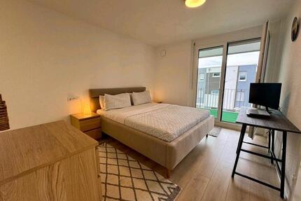 Helle moderne Wohnung mit großem Balkon und Tiefgaragenstellplatz - Butzbach
