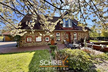 Haus zum Kaufen in Neuenkirchen 589.000,00 € 229.23 m²