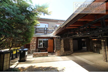 Einfamilienhaus mit Einliegerwohnung und Werkstatt in ruhiger grüner Lage in Forst