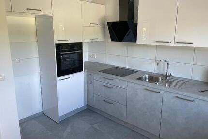 Helle Maisonettewohnung mit dir. Gartenzugang und Wintergarten - Waldems