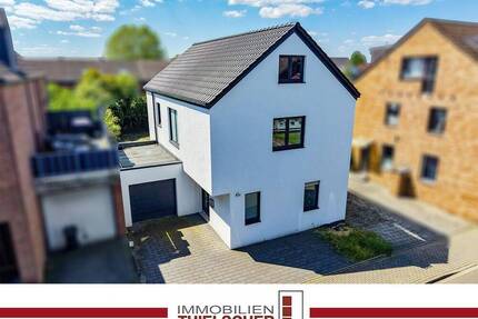 Neubau-Einfamilienhaus mit Garage und Garten - viel Potenzial zur individuellen Fertigstellung - Übach-Palenberg Marienberg