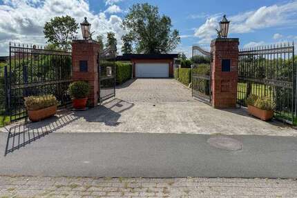 Haus zum Kaufen in Südbrookmerland Münkeboe 359.000,00 € 300 m² - Südbrookmerland / Münkeboe