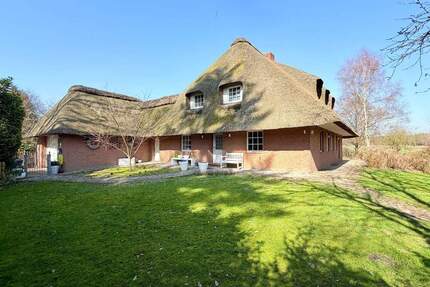 Exklusives Reetdachhaus mit großzügigem Grundstück und hochwertiger Ausstattung in ruhiger Lage - Hemsbünde Hastedt