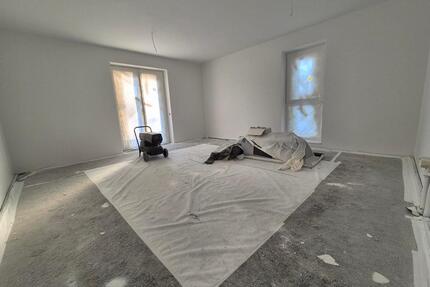 Lichtdurchflutete Neubau-OG-Wohnung mit Aufzug, TG & hochwertiger EBK - Norderstedt