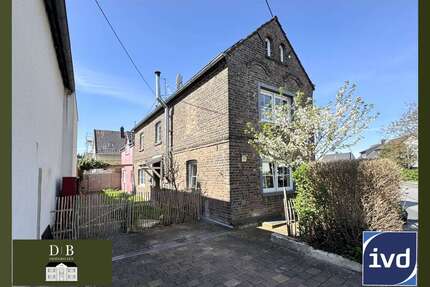 Haus zum Kaufen in Niederkassel Mondorf 399.990,00 € 125 m² - Niederkassel / Mondorf