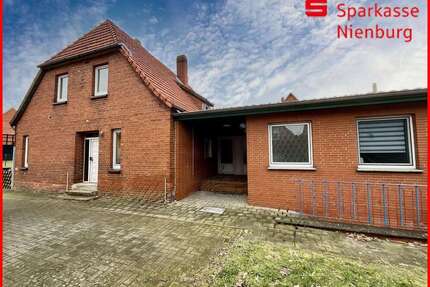 Haus zum Kaufen in Haßbergen 230.000,00 € 265 m²