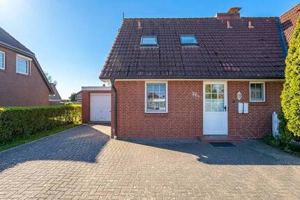 Gemütlich wohnen in Friedrichskoog - liebevoll gepflegte Doppelhaushälfte mit Charme