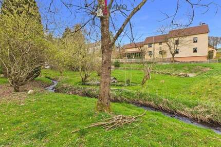 Liebevoll gepflegtes Einfamilienhaus mit idyllischem Garten und romantischem Bachlauf - Heilbach