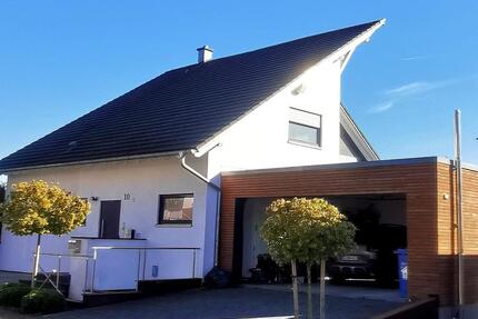 Exklusives Einfamilienhaus mit Einliegerwohnung, Wintergarten & e - Burgrieden