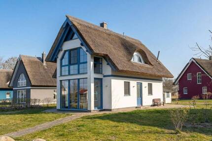 Traumhafter Seeblick: Individuelles Ferienhaus unter Reet in naturnaher Lage - Neuenkirchen Vieregge