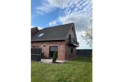 Neubau-Erstbezug: moderne Doppelhaushälfte mit Garten - Salzhausen