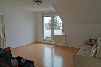 Helle 2-Zimmer-Wohnung mit Dachterrasse, Stellplatz, optional PV - Haßfurt