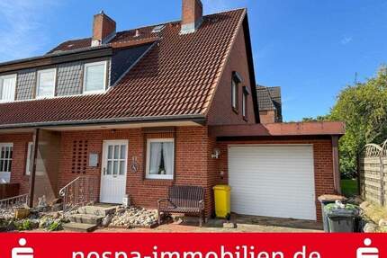 Teilweise unterkellertes Reihenendhaus mit Garage und Terrasse im beliebten Stadtteil Rödemis - Husum