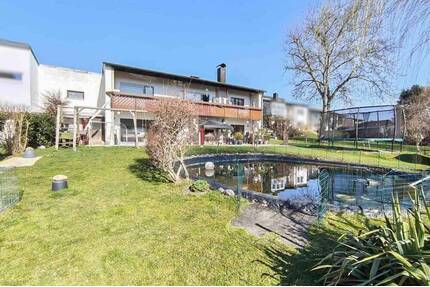 Großzügiges Familienidyll mit Badeteich, Gartenparadies & viel Potenzial - Velden