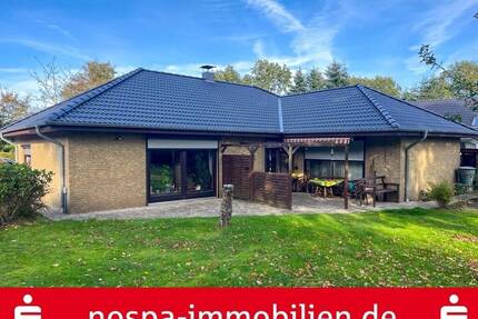 Gepflegter Winkelbungalow mit Südwest-Terrasse und massiver Garage in Drelsdorf