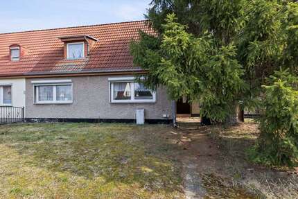Haus zum Kaufen in Leegebruch 230.000,00 € 133.48 m²
