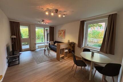 Möbliertes 1,5-Zimmer-Apartment mit Terrasse, Gartennutzung & TG - Wedel